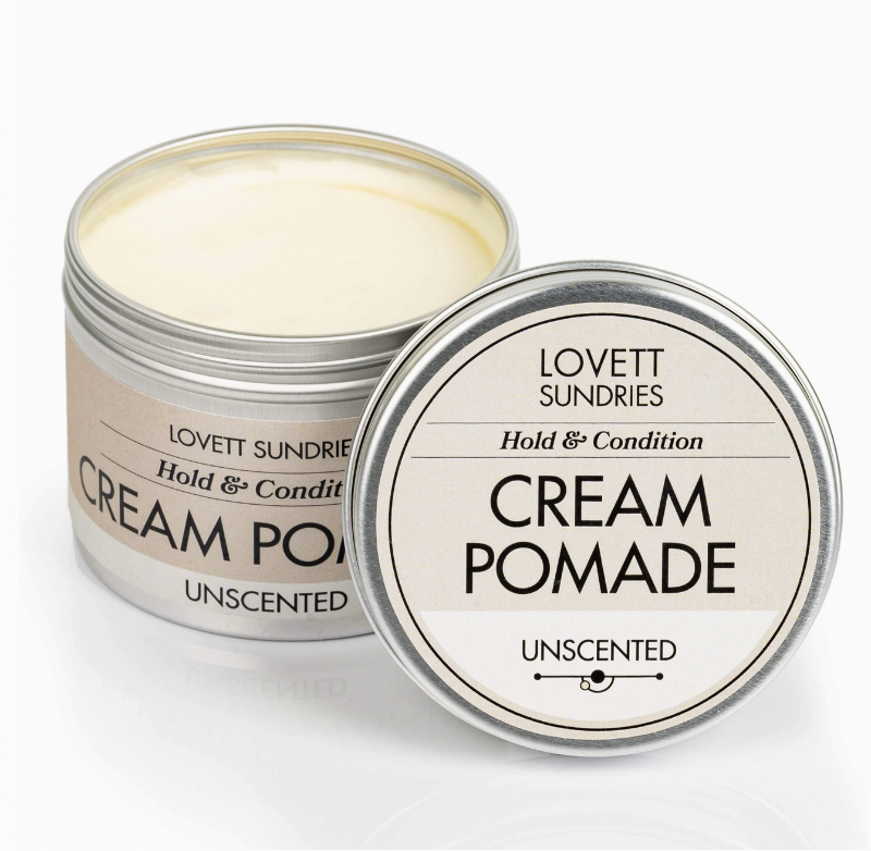 Cream pomade jar with lid on a white background