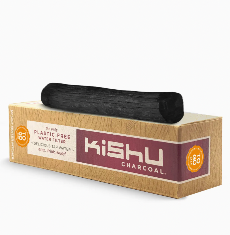 Kishu Charcoal packaging with a black charcoal stick on a white background