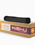 Kishu Charcoal packaging with a black charcoal stick on a white background