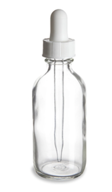 glass dropper bottle on white backdrop